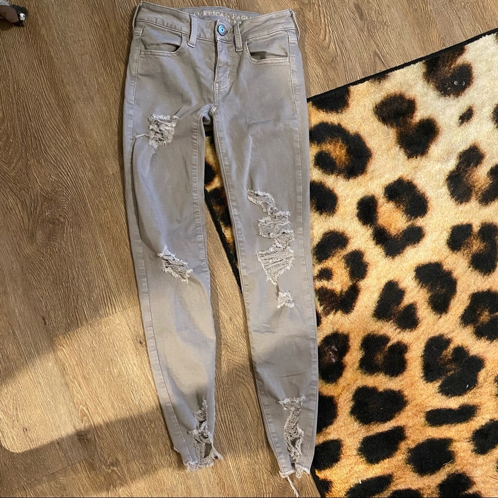 grey ripped jeans